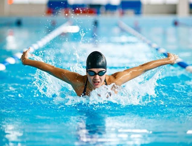 Swimming athletes in action